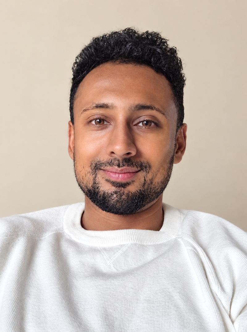 Dr Abhinav Vepa in a white jumper against a plain background